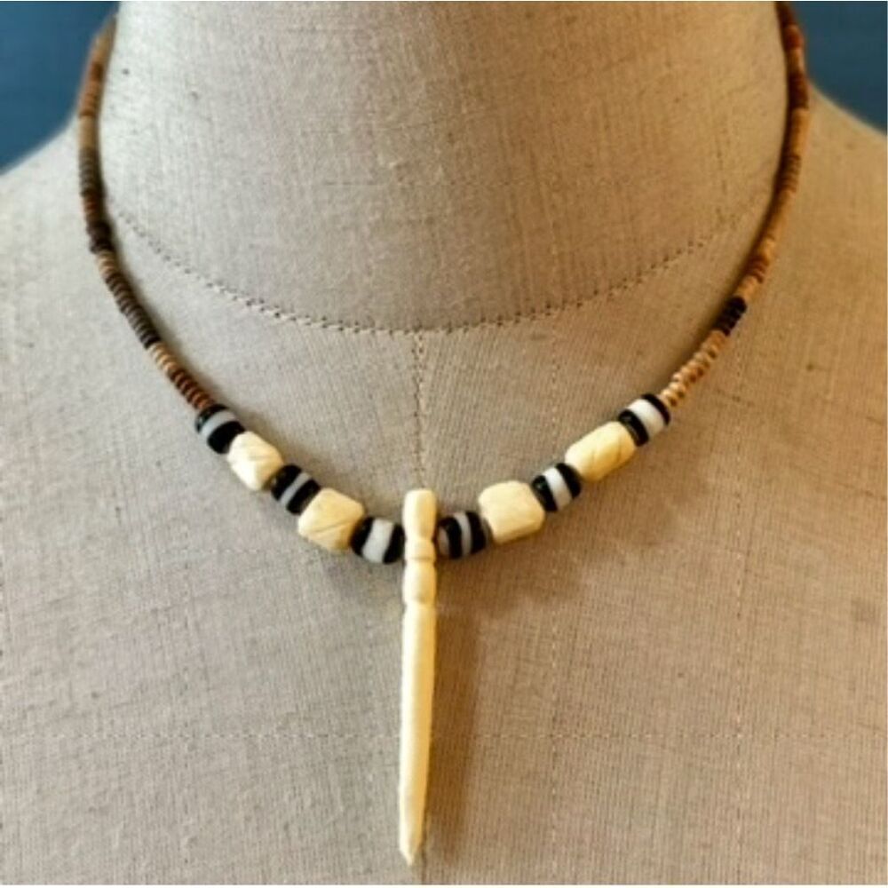 Bone and wood  necklace with tusk pendant